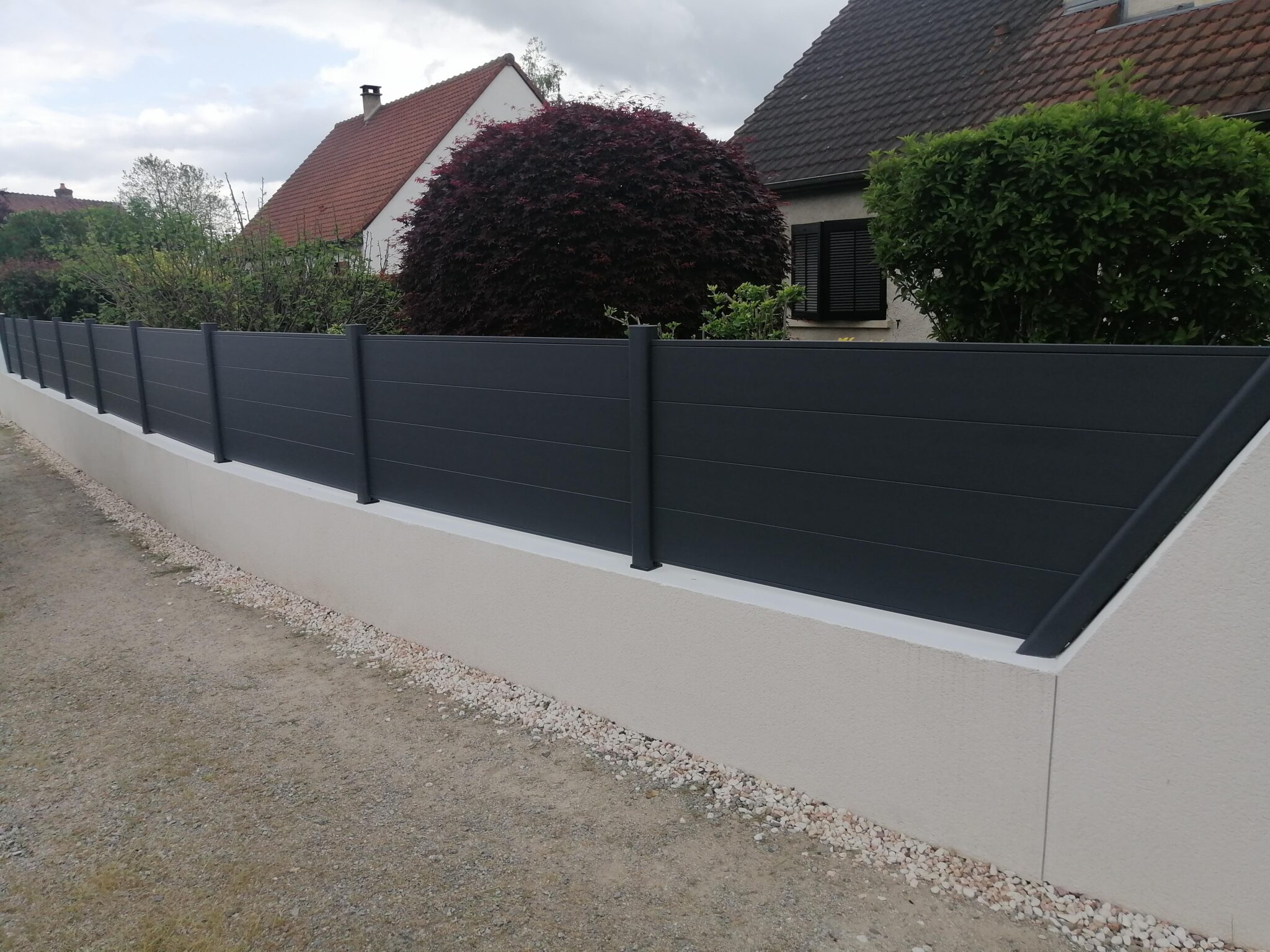 Comment fixer des poteaux de clôture sur muret — free download